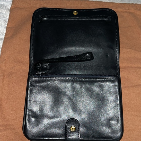 Loewe Handbags - Preloved Loewe wristlet great condition lambskin leather has many pockets Black